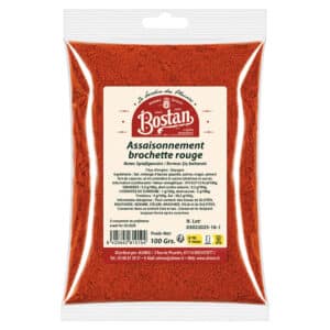 Bag of red spice mix labeled 'Assaisonnement brochette rouge' by Bostan, 100 g net weight.