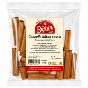 Clear plastic bag containing cinnamon sticks with a beige product label reading Cannelle bâton cassia, brand Bostan.