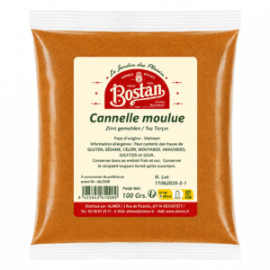 Bag of ground cinnamon (Cannelle moulue) in a clear plastic pouch with a beige label and red Bostan logo on the front, spice product image.