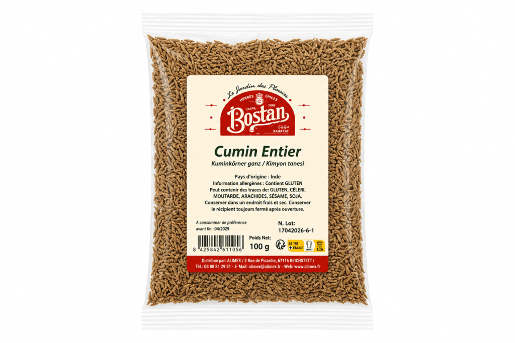 Bag of whole cumin seeds in a clear plastic bag with a beige front label reading 'Cumin Entier' and a red Bostan logo at the top center.