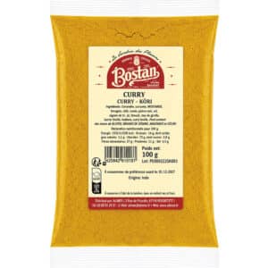 Yellow spice packet labeled Bostan curry powder, showing ingredients and 100 g net weight on a beige label.
