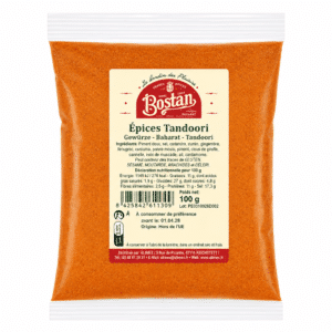 Bag of Bostan Epices Tandoori spice mix with orange powder and a beige label in a sealed plastic pouch.