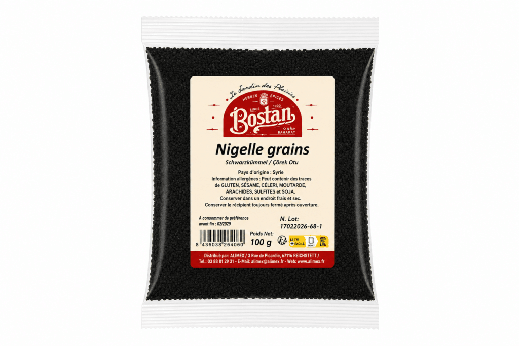 Bag of nigelle (nigella) grains in a clear plastic pouch with a beige label reading 'Nigelle grains' and brand 'Bostan'