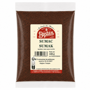 Bag of ground sumac spice labeled 'SUMAC SUMAK' with Bostan brand on cream label, 100 g net weight, origin Turkey.