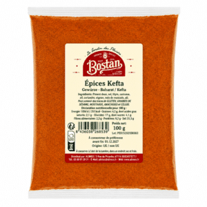 Plastic pouch filled with bright orange Kefta spice mix, beige label shows 'Épices Kefta' and Bostan branding.