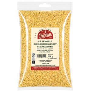 Bag of Bostan garlic granules (ail semoule), transparent plastic pouch filled with yellow granules, 500 g, label with product details