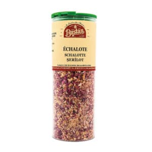 Container of dried chopped shallots from Bostan, in a tall clear jar with a green lid and beige label