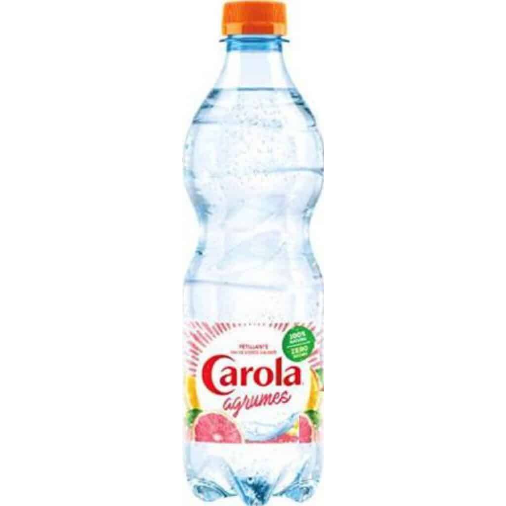 Plastic bottle of Carola citrus soda with an orange cap on a white background, label reads 'Carola' citrus flavor.